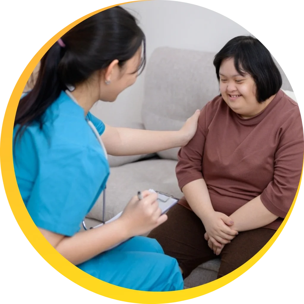 nurse taking care of a woman with disability