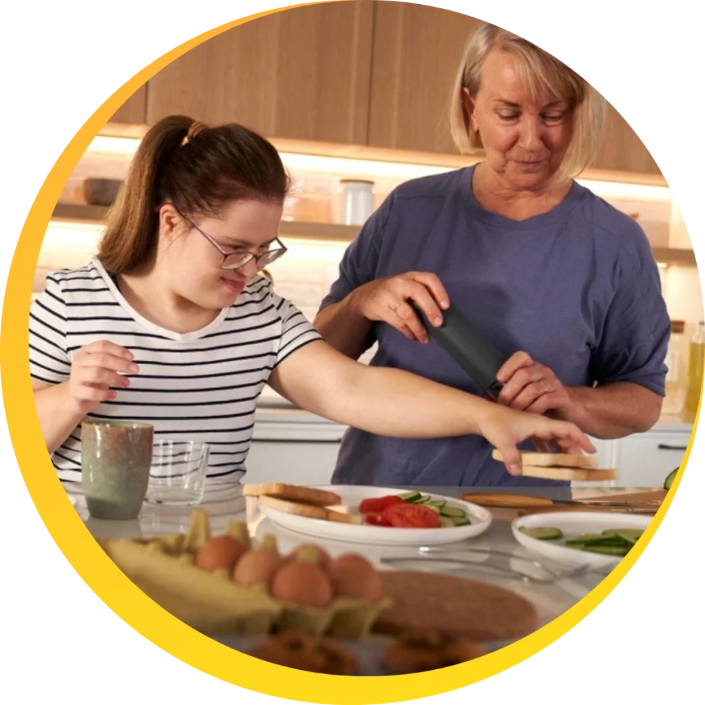 disabled girl cooking food in kitchen
