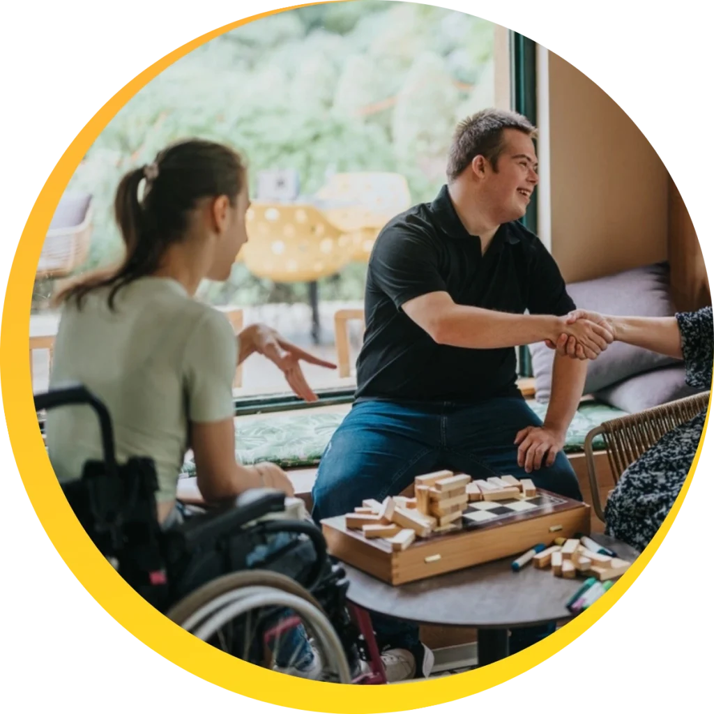 two disabled people playing together